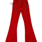 Edikted  - Lace Up High Waist Flare Leg Jeans in Engine Red Photo 0