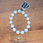 Juicy Couture  Stretch White Beaded Charm Bracelet with Dangling Starfish Charm Photo 1