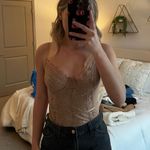 Iris Tan Lace Bodysuit Photo 1