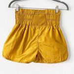 Free People  Movement The Way Home High Waisted Shorts in Gold Photo 5