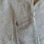 Nike Heathered grey therma fit  sweatpants women’s size medium Photo 1