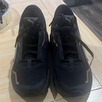 Puma Black Sneakers with Gold Highlights Photo 0