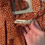 Liberty Love  tie shoulder ruffle mini dress.​ Photo 7