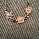 Vintage gold colored flower with white center necklace and matching earrings EVC Photo 1