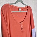 Free People  We the Free Star Relaxed Distressed Henley Top Orange Linen Small Photo 2