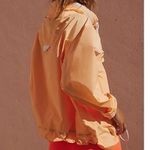 Free People Movement Rain And Shine Jacket size S NWT Morning Sun Orange Photo 1