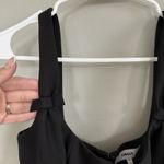 Likely  Women's Black Midi Sheath Dress Sz 4 Bow Accents Slit LBD Office Siren Photo 2