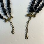 Vintage style 3 strand black beaded necklace with gold tone feather accent Photo 2