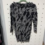 Black and Gray Ruffled V Photo 2