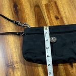 Coach  Signature Turnlock Wristlet Photo 9