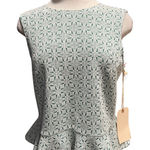 Sunday in Brooklyn  Peplum top with a geometric pattern  
Fits like a Small NWT Photo 0
