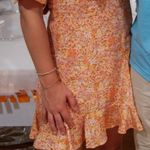 Showpo  orange floral mini dress puff sleeve Photo 2