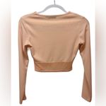Pretty Little Thing  Woman’s Peach Colored Ribbed Long Sleeve Crop Top Size 8 Photo 1