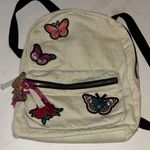 Atmosphere  BRAND OFF WHITE DENIM BACKPACK WITH BUTTERFLY PATCH DESIGN  
PRELOVED Photo 0