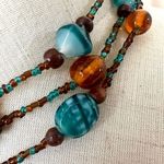Blue and amber tone long glass beaded necklace Photo 2