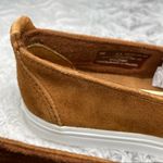 Minnetonka  Women's Gabi Suede Round Toe Slip-Ons in Brown Photo 4