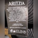 Aritzia Babaton Sculpt Knit Off-shoulder Top in Black. Size Large Photo 8