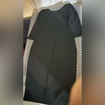 Elegant Black Dress with Gold Zipper Size L Photo 4