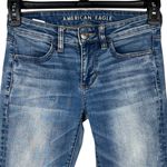 American Eagle  SZ 0 X-Long Jeggings Jeans Low-Rise Chewed Hems Whiskered Stretch Photo 1