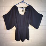 White House | Black Market  Elegant Black Garment Photo 0