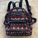 Disney  Park Loungefly Christmas mini backpack excellent condition see all photos Photo 13