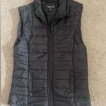 Rue 21 black puffer vest size small Photo 0