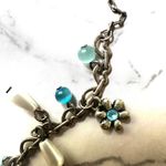 Silver tone blue faux pearl flower charm necklace Photo 5