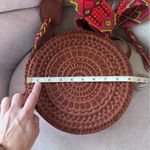 Bohemian Woven Round tooled Leather crossbody with woven Strap NWOT Brown Photo 9