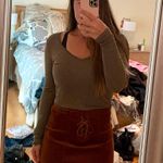 Buckle V-Neck Long Sleeve Top Photo 1