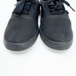 Vans  Black Sneaker Shoes in women's size 8 and men's size 6.5 Photo 2