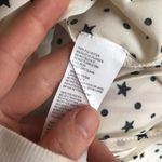 Nasty Gal Star Print Tie-Front Blouse Photo 5