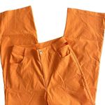 SheIn orange pants with hip cut out Photo 8