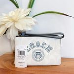 Coach NWT Corner Zip Wristlet In Signature Canvas With Varsity Motif Photo 5