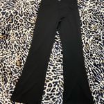 crossover flared yoga pants Black Size L Photo 0