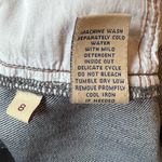 CAbi Dark blue classic 5 pocket mid-rise flare jeans Women’s Size 8 Photo 4