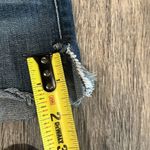 Level 99 dark denim wash slight distressed w/ side hem slit fray at hem Photo 5