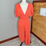Lulus Spend Some Time Coral Smocked Short Sleeve Culotte Jumpsuit Medium Orange Photo 1