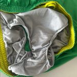 Nike  Women’s Size Large Green and Yellow Lightweight Performance Shorts Photo 3