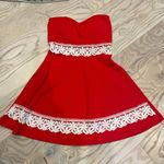 Red strapless dress white lace trim Photo 0