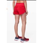 Lululemon Speed Up Short with a 4" inseam in Flamenco Red Swift Photo 1