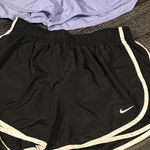 Nike Women's Athletic Shorts in Black and Light Purple Dry Fit Photo 0