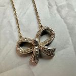PAJ Silver and gold Tone Textured Bow Pendant Necklace Photo 2