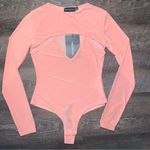 Pretty Little Thing Peach Slinky Cut Out Long Sleeve Thong Bodysuit NWT Photo 0