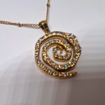 Gold snake swirl pendant necklace Photo 1