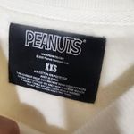 Peanuts Snoopy Cote D'Azur Graphic Sweatshirt' women's XXS White Photo 2