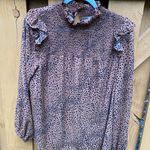 ee:some Cheetah print top Photo 2