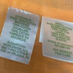 Lilly Pulitzer Kay Babydoll EYELET Dress Cantaloupe Oversize Pinwheel Sz 6 Photo 9