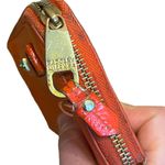 Badgley Mischka zip around red wallet with several compartments Photo 9