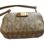Michael Kors -SMALL CROSSBODY BAG Gorgeous crossbody bag, tan color bag with gold hardware, zip top closure, inside has an open pocket and card slots, no call outs, excellent condition Measures: 7x5x2 inches Photo 3