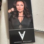 Stylish Cream Backpack with Gold Accents Photo 1